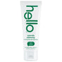 A white tube of hello Naturally Healthy Whitening Fluoride Toothpaste with green text, displaying “mint to be” and “farm grown mint + coconut oil”—ideal for those seeking a natural whitening toothpaste.