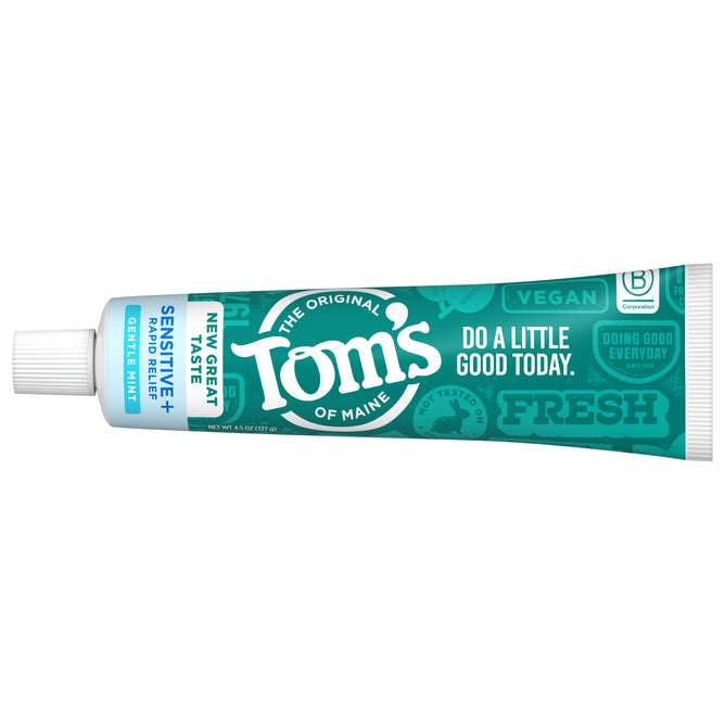 A tube of Tom’s of Maine Sensitive + Rapid Relief Fluoride Free Toothpaste in teal packaging with white text, featuring Gentle Mint and “Do a Little Good Today,” highlights its vegan values and rapid sensitivity relief.