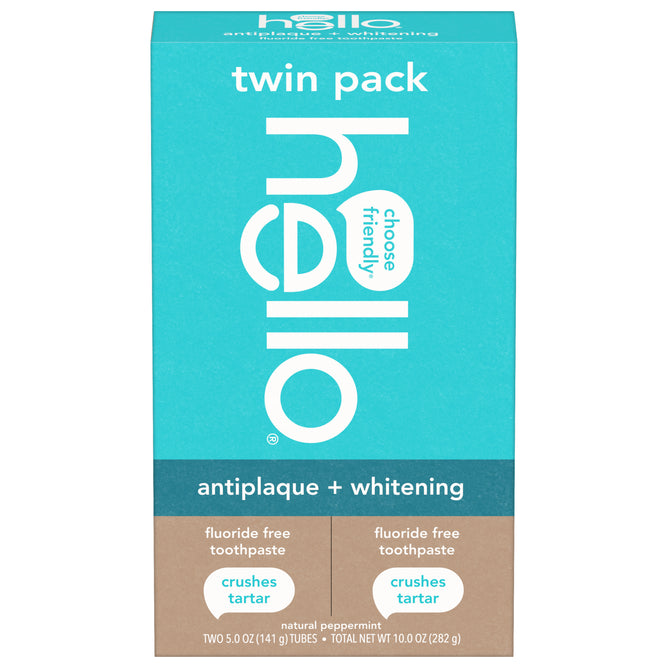 A twin pack of hello Antiplaque + Whitening Fluoride Free Toothpaste in peppermint flavor, with teal packaging and white and brown text accents.