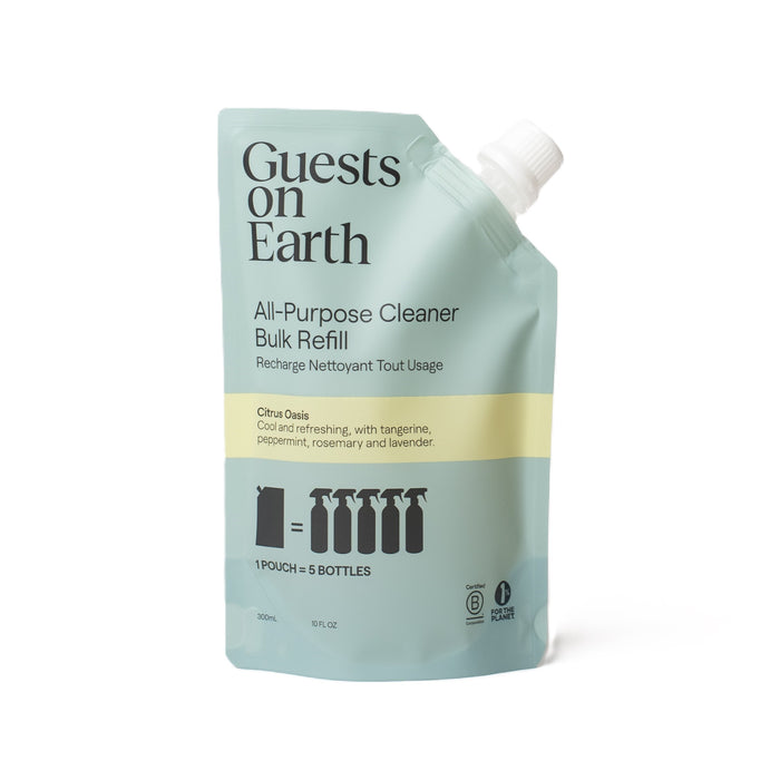 The light green Guests on Earth All-Purpose Cleaner Bulk Refill pouch, with a convenient spout, offers intoxicating scents like Citrus Oasis from tangerine and peppermint oils. It is equivalent to five bottles.