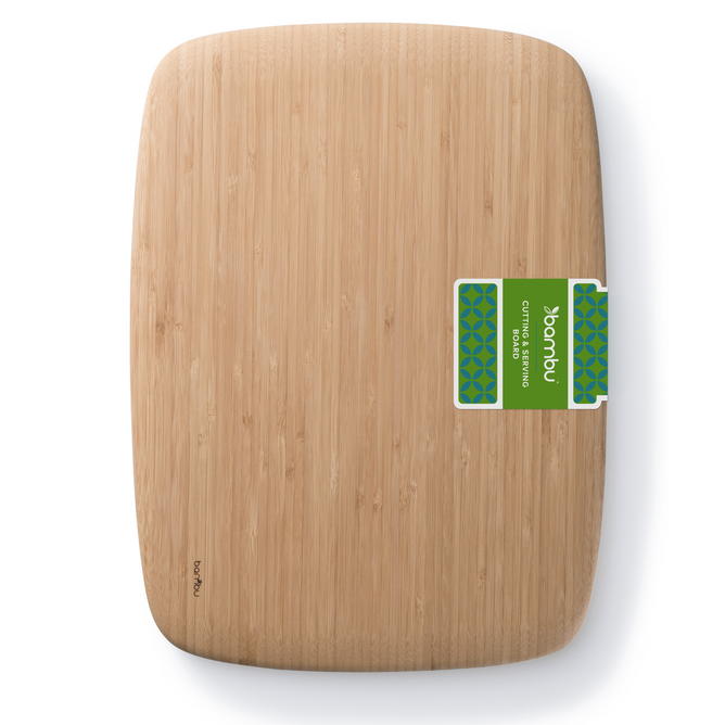The Bambu Classic Bamboo Cutting Board is rectangular with rounded edges, a green and blue label in the upper right corner, and a smooth, natural wood grain finish—ideal for serving or food prep.