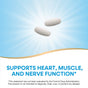 Two white oblong tablets float on a blue background with light rays, above the text Supports heart, muscle, and nerve function*, highlighting Natures Way Magnesium Glycinate Complex. An FDA disclaimer appears at the bottom.