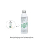 A metal bottle of Dirty Labs Bio Laundry Detergent with Phytolase®—Magnolia, Bergamot, Cedar—featuring a green and white label stands on a white background. An inset displays the previous packaging. Text below reads: New packaging. Same trusted formula of our bio laundry detergent.