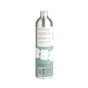 A tall, silver aluminum bottle branded Dirty Labs, labeled “Bio Laundry Detergent with Phytolase® - Magnolia, Bergamot, Cedar,” features a green and white label with geometric patterns, product information, and certification symbols—this eco-friendly laundry supplies container is shown from the back.