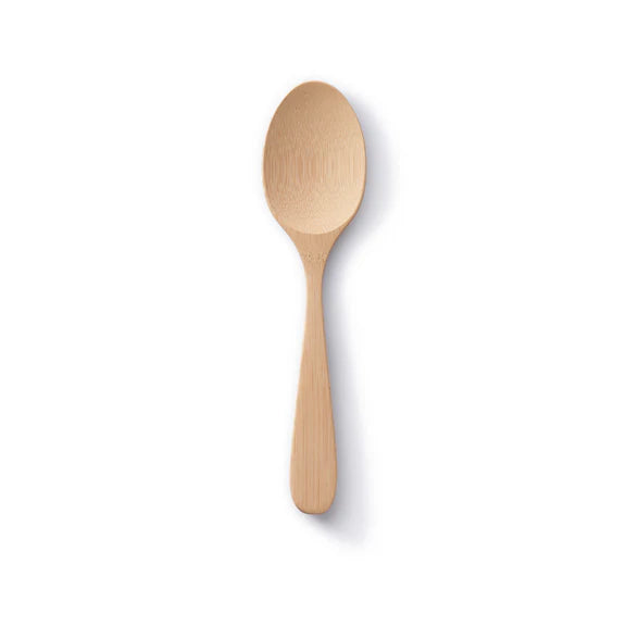 The Bambu Bamboo Serving Spoon is an eco-friendly kitchen utensil with a rounded bowl and flat handle, shown against a plain white background with a soft shadow on the right.