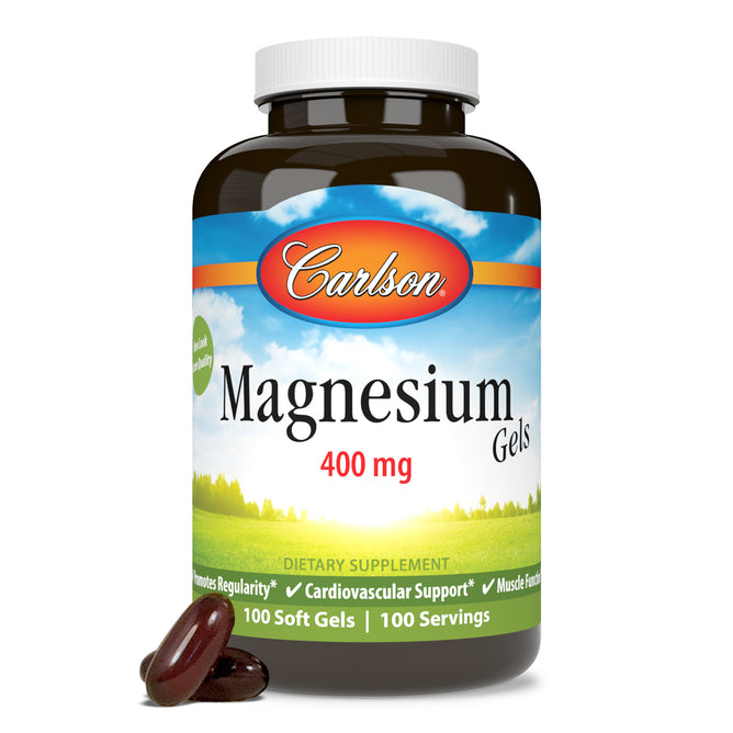 A bottle of Carlson Labs Magnesium Gels, 400 mg, with a blue-green label and white cap is shown next to two dark softgel capsules. Each serving supports healthy muscle function. Contains 100 softgels for 100 servings.