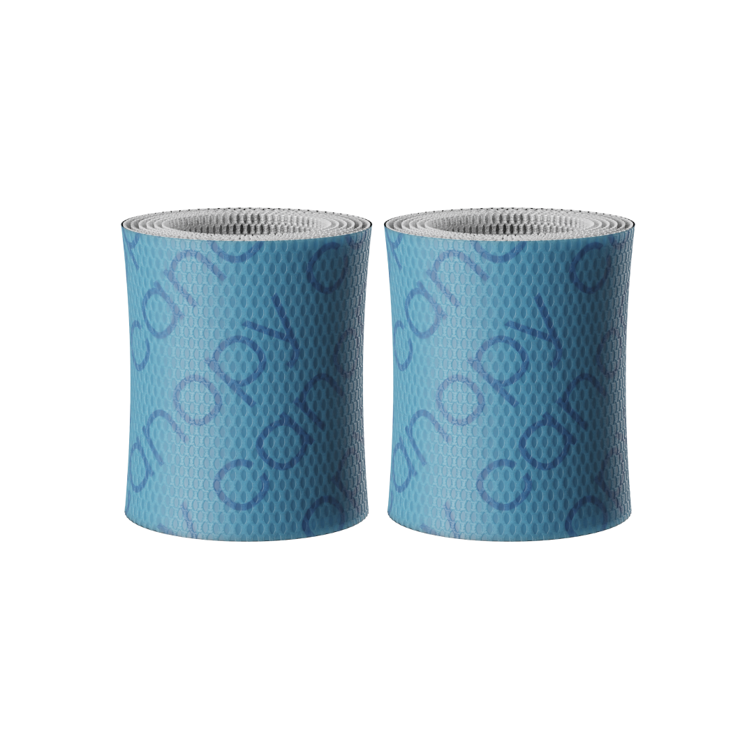 Two Canopy Bedside Humidifier Filter 2.0 rolls, featuring a blue mesh design with the brand name “canopy” in a repeating pattern, stand upright side by side against a plain background. Sold as a 2 pack.