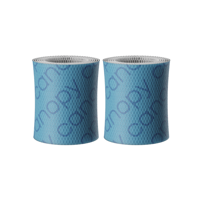 Two Canopy Bedside Humidifier Filter 2.0 rolls, featuring a blue mesh design with the brand name “canopy” in a repeating pattern, stand upright side by side against a plain background. Sold as a 2 pack.