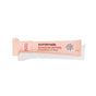 A pink paper squeeze tube labeled Sunniemade Nourishing Lip Balm - Blossom Butter, featuring a floral design and white polka dots, is shown on a white background.