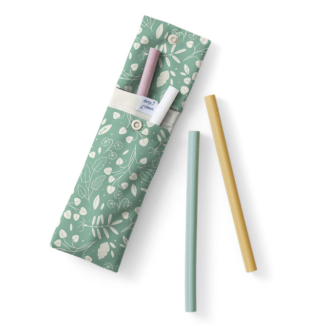 Esembly Baby’s 4-pack Reusable Silicone Sipper Straws come in pastel pink, white, green, and yellow. Stored in a green floral pouch made from upcycled materials, they offer eco-friendly sipping at home or on the go.