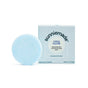 A round, light blue conditioner bar from Sunniemade, labeled “Smoothing Conditioner Bar - Chia Glow,” sits beside its box and features nourishing chia seed oil to add shine, reduce frizz, and provide up to 75 washes.
