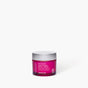 A small, round, translucent magenta jar of Andalou Naturals 1000 Roses Fortifying Night Cream with a silver lid, featuring white text detailing the product name and benefits.