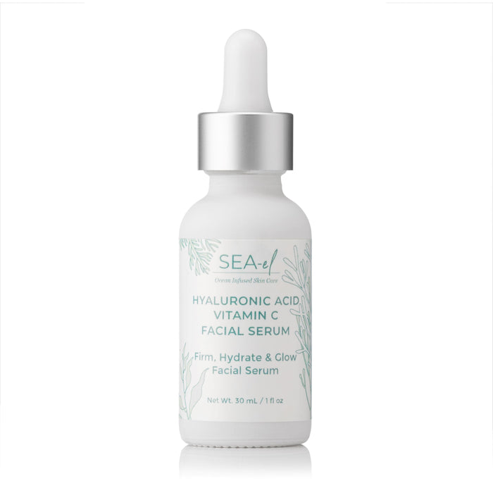 A 30 mL (1 fl oz) white bottle of Sea-el Hyaluronic Acid Vitamin C Serum with a dropper cap, labeled as a firming and hydrating solution for glowing skin.