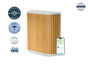The Windmill Air Purifier Max by Windmill Air showcases a sleek wood finish and displays its awards and certifications on the sides. Equipped with a high-performance HEPA filter for superior air quality, it also features advanced smart control capabilities—demonstrated by a smartphone in front displaying the app interface.