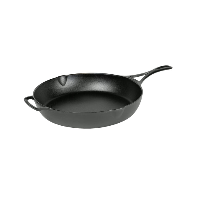 The Lodge Blacklock Blacklock Triple Seasoned Skillet is a black cast iron skillet with a long handle and a smaller helper handle, shown on a white background.