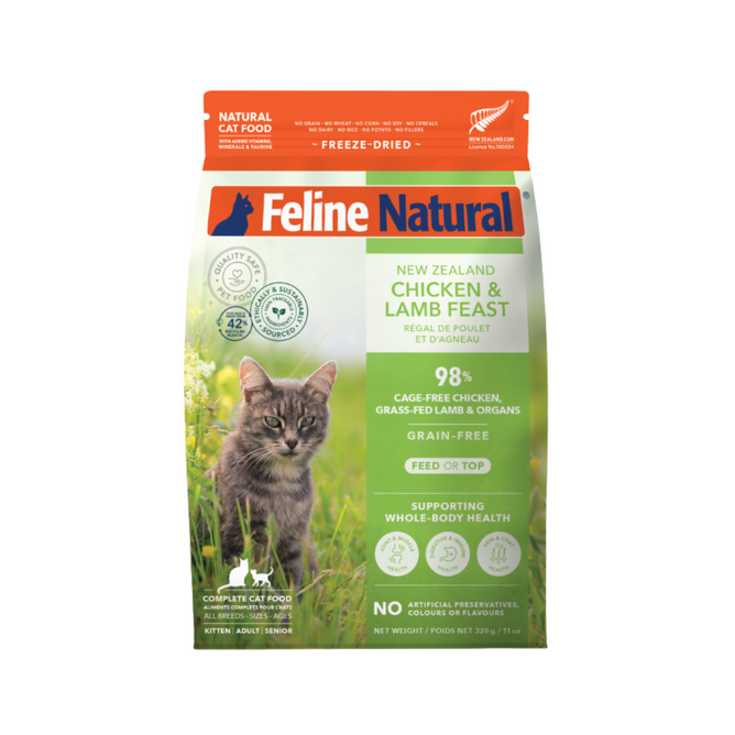 Feline Natural Grain-Free Freeze-Dried Cat Food features a gray tabby in green grass. This chicken & lamb feast supports whole-body health for your cat and is completely grain-free.