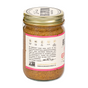 A clear glass jar of Big Spoon Roasters Fiji Ginger Almond Butter with a gold lid features a label noting it’s non-GMO, gluten-free, paleo, vegan, and made with sustainable ginger, showcasing the brand’s commitment to quality.