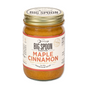 A small-batch Maple Cinnamon Peanut & Pecan Butter by Big Spoon Roasters, featuring sea salt, a gold lid, and a cream label with orange and black text.