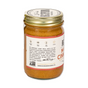A glass jar of Big Spoon Roasters Maple Cinnamon Peanut & Pecan Butter with a gold lid. The label notes it is gluten-free, paleo, keto, vegan—an organic nut butter made for mindful snacking with a short description on the back.