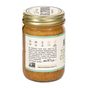 A glass jar with a gold lid labeled Big Spoon Roasters Toasted Coconut Almond Butter, a low-sugar nut butter made with heirloom Mission almonds. The label highlights it is Gluten Free, Palm Free, Soy Free, and Vegan.