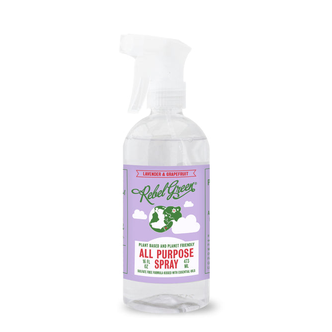 Rebel Green All Purpose Spray is a natural cleaner with essential oils in a lavender grapefruit scent. It comes in a clear spray bottle with a purple label featuring green and red text and an illustration of Earth with two leaves.