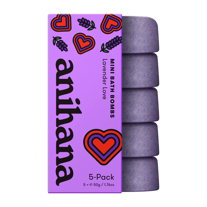 A rectangular purple Anihana Bath Bomb Minis 5-Pack box with heart designs is shown beside five round purple bath bombs. Infused with coconut oil, each is 50g/1.76oz for a relaxing spa-like experience.