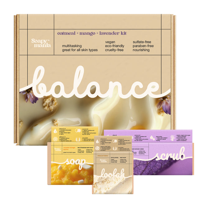 Soapymania’s Body Care Set “balance” features oatmeal, mango, and lavender. The box shows benefits and ingredients, with soap, body butter, exfoliating bar soap, and sugar scrub cubes displayed in front.