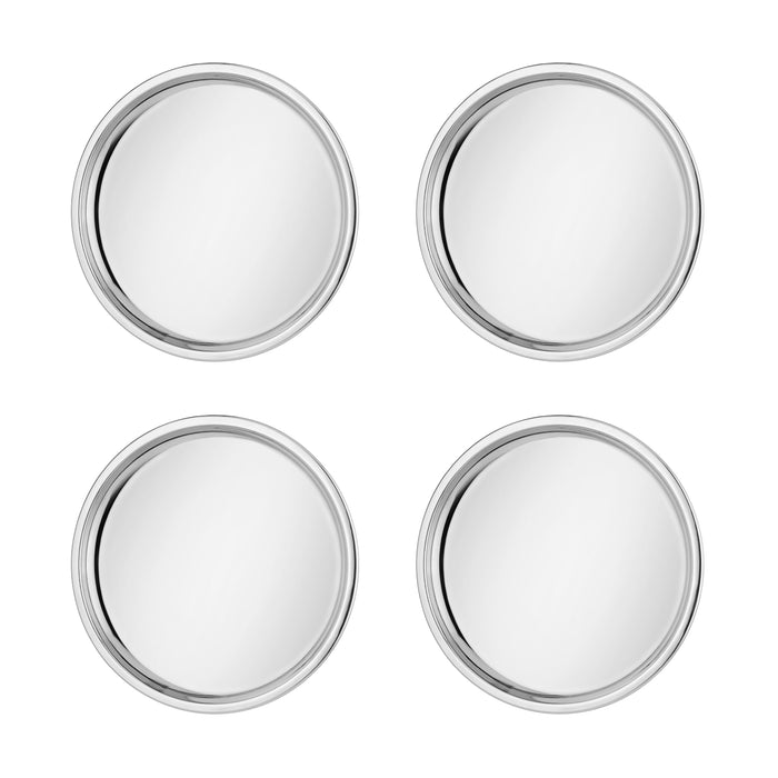 Four Purposeful Plates by Ahimsa—round, stainless steel dinner plates arranged in a 2x2 grid on a white background, viewed from above. These non-toxic plates are perfect for safe mealtimes with kids.