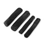 Four Black + Blum Active Charcoal Water Filters of varying lengths are arranged parallel on a white background, highlighting their sleek Binchotan charcoal design.