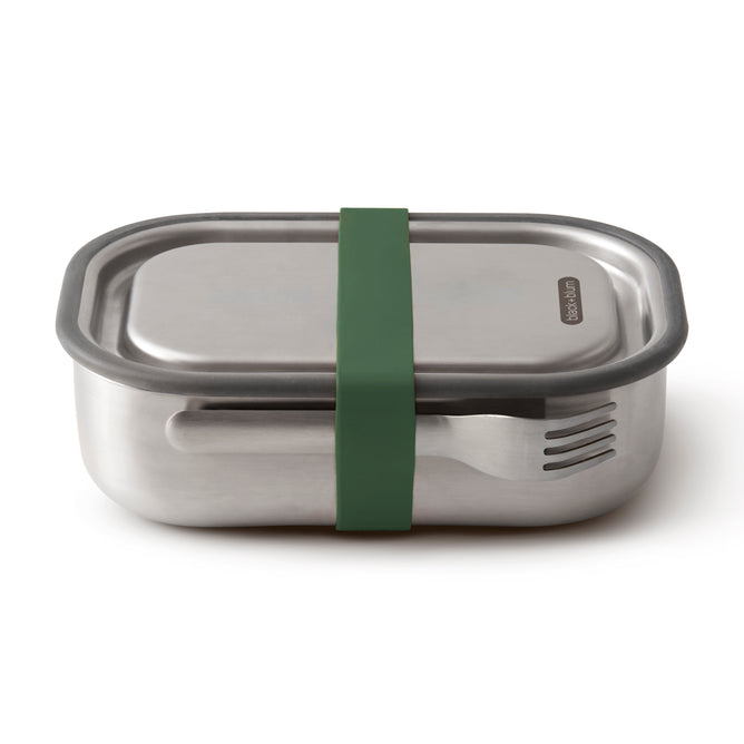 The Black + Blum Stainless Steel Lunch Box Large features a green silicone band to secure the lid and a matching metal fork underneath—keeping your meals fresh and tidy wherever you go.