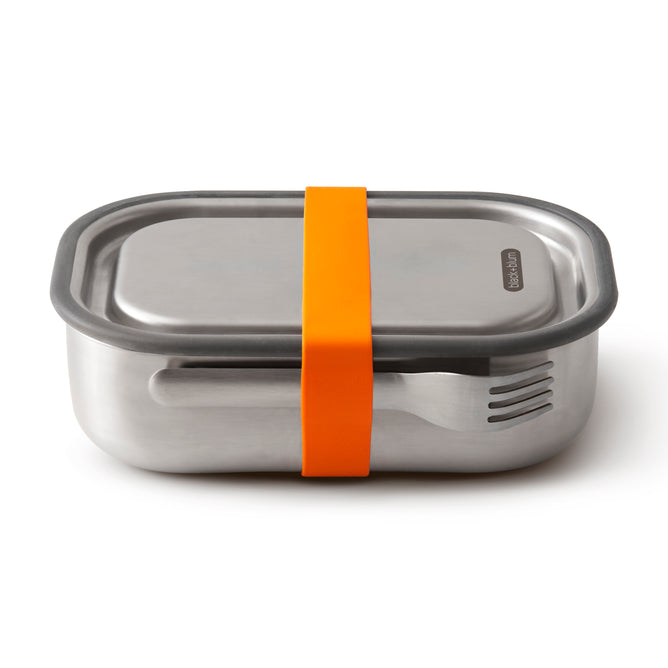 The Black + Blum Stainless Steel Lunch Box Large is a rectangular, leak-proof lunch box with a lid secured by an orange silicone band. A metal fork fits under the band, making it ideal for meals on the go.