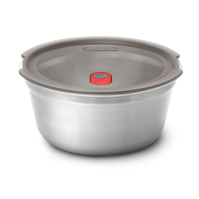 The Black + Blum Steel Food Bowl is a leakproof stainless steel lunch container with a matching lid featuring a center red valve, shown on a plain white background.