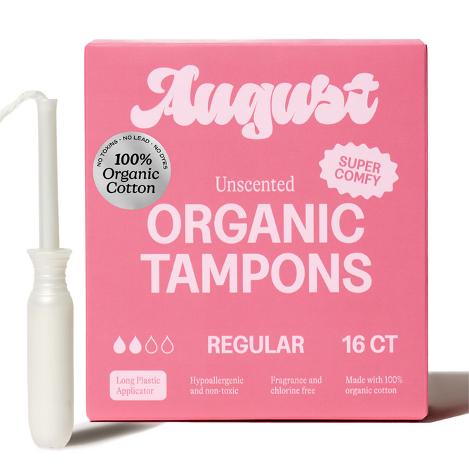 A pink August Regular Tampon box displays Super Comfy and 100% Organic Cotton badges. Next to it is a white hypoallergenic tampon with a BPA-free applicator. Each box contains 16 regular tampons.