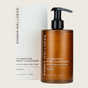 A brown pump bottle labeled "Hydrating Body Cleanser" by Ember Wellness stands in front of its matching box with similar text. Formulated to support the skin microbiome, this cleanser features the Sheer Santal scent and is available in a 13 fl oz (385 mL) size.