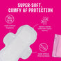 The FLO Organic Bamboo Period Pads Megapack by Here We Flo is displayed on a pink background, described as ultra-absorbent, super-soft, fragrance-free, chlorine bleach-free, and made from organic bamboo viscose for comfort.