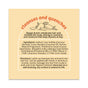 A product label for Sunniemade’s Moisturizing Shampoo Bar - Mighty Mango features the heading “Cleanses and Quenches,” highlighting ingredients and usage directions for this hydrating mango butter hair care formula. Above the text, illustrations of mangoes stand out against a beige background, evoking the nourishing essence of this shampoo bar.