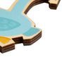 A close-up of a blue elephant-shaped piece from the 2-in-1 Wooden Puzzle - Elephant, 3+ Years by HABA, featuring orange feet.