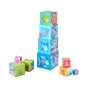 A stack of four HABA Stacking & Nesting Cubes - Rainbow Fish featuring ocean life, surrounded by additional blocks displaying numbers and sea creatures.