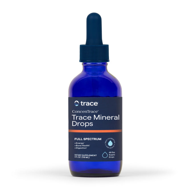 A blue glass bottle of Trace Minerals ConcenTrace Trace Mineral Drops with a dropper cap contains 4 fl oz (118 mL) of dietary supplement from Great Salt Lake minerals, supporting energy, bone health, and digestion.