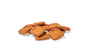 A small stack of brown, square-shaped Upcycled Dog Brew Biscuits by Portland Pet Food Company, featuring a textured surface, displayed on a white background.