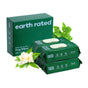 Earth Rated Dog Grooming Wipes – Extra Thick, White Tea Basil scented, are shown with basil leaves and a white flower to highlight natural ingredients. Each pack has 100 wipes; the box contains 400 wipes.