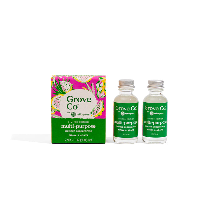 Two small clear bottles and a colorful box labeled Grove Co. Multi-Purpose Cleaner Concentrate - Summer Collection are shown. This refillable system features green, pink, and white botanical designs and uses bio-based ingredients.