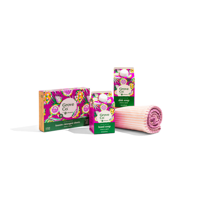 The Spring Clean Essentials Set - Summer Collection by Grove Co. is displayed with a neatly rolled pink-striped cloth against a white background.