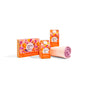 The Grove Co. Spring Clean Essentials Set - Summer Collection includes laundry detergent sheets, seasonal hand soap, orange-pink floral dish soap, and a pink-striped cloth on a white background.