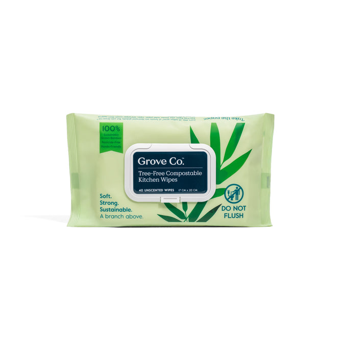 A pack of Grove Co. Bamboo Compostable Kitchen Wipes, unscented and made with bamboo, contains 40 wipes in light green packaging featuring leaf graphics and a DO NOT FLUSH symbol on the front.