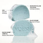 Two light blue, oval VOESH Body Buffing Bars With AHA are stacked. Labels highlight AHA (smooth & renew), Microcrystalline Cellulose (exfoliate & refine), Black Sesame (nourish & protect), and Baechu Biome Complex—ideal for KP bump exfoliation.