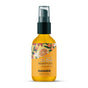 A 29.6 ml (1 fl oz) bottle of Badger Balm Seabuckthorn Glow Beauty Oil features a biocompatible oil formula, ideal for organic skincare routines. The yellow-orange label is adorned with floral and fruit illustrations, and the bottle includes a convenient pump dispenser.
