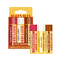 Burt’s Bees Lip Balm Cozy Season set features three moisturizing lip balms—cranberry spritz, sugar cookie, and salted caramel—in yellow tubes with matching caps and special “cozy season” packaging.