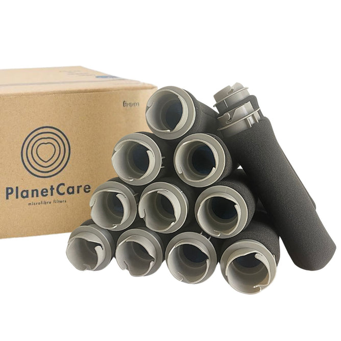 A PlanetCare 2.0 Filter Cartridges Refill Pack sits beside a pyramid stack of black cartridges with gray ends, plus one filter on top. These PlanetCare filters for washing machines support closed-loop recycling.