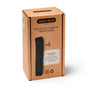 A brown cardboard box of Black + Blum Active Charcoal Water Filter refills, illustrated with a charcoal stick, labeled x4, and noted to make tap water taste great.